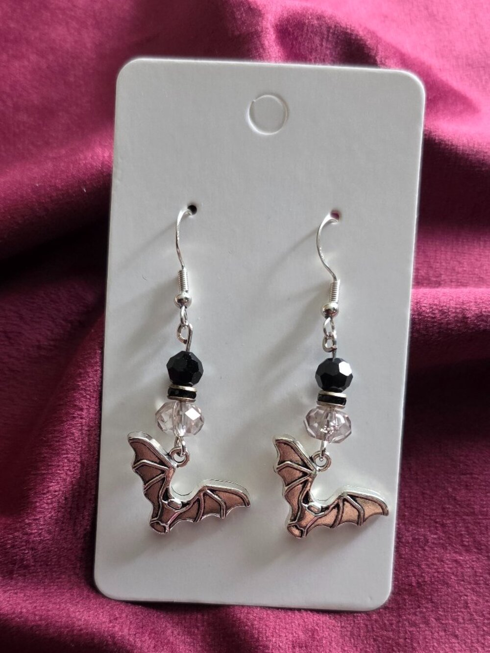 gothic-style dangling bat earrings